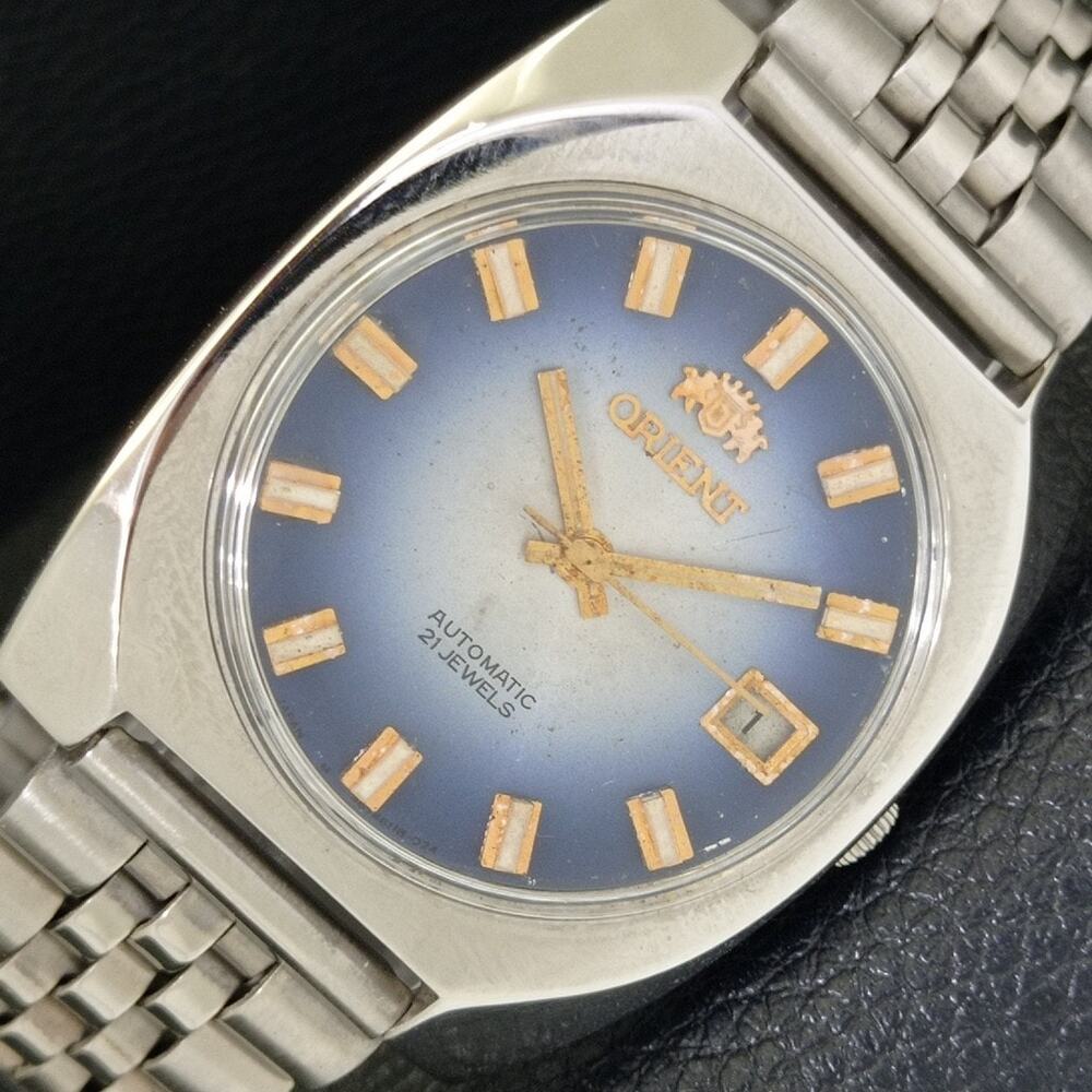 Vintage 1981 Orient Automatic Mens Silver Watch W/daydate & Blue accents